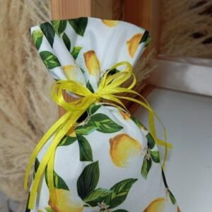 Μπομπονιέρα βαπτισης πουγκί βαμβακερό με θέμα το λεμονακι